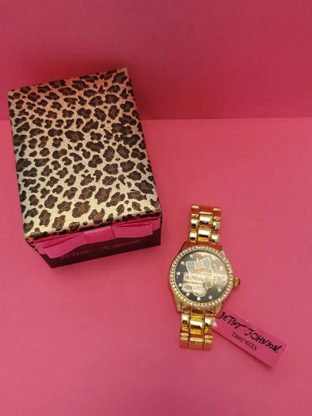 Betsey Johnson Gold-Tone Watch with Black Dial and Pink Bow Accent